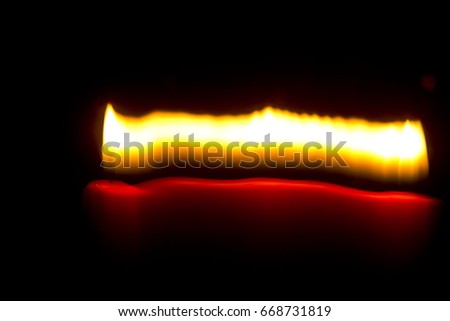 Abstract flame lines. Light from candle.