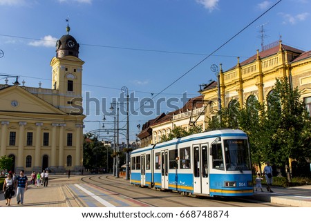 Old tram in Kossuth square, Debrecen, Hungary Royalty-Free Stock Photo #668748874