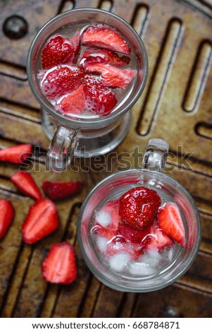 Strawberry lemonade with fresh berries 