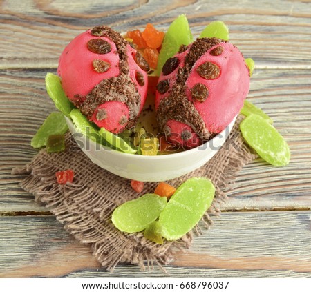 Ladybugs are made of ice cream. A creative dessert for children and good mood.