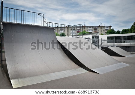 Skate park for extreme sports exterior. Toned image. Wide angle view.