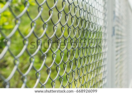 Chain Link Fence, Close up of wire fence on green background