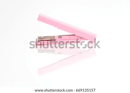 pink mini staple on white background