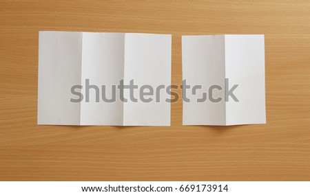 white template paper on wood texture with copy space for text a4 (education concept)