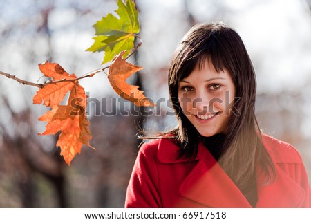 Woman in autumn park