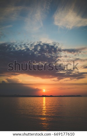 Stunning sunrise at sea in summer