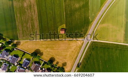 Top view on a barn in the field. Neu-Ulm, Germany.