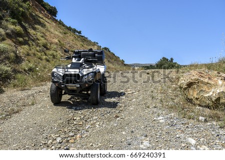 ATV offroad on mountain and sky background. Greece