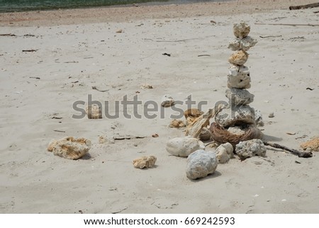 Sort mediation stones on the beach with seaview