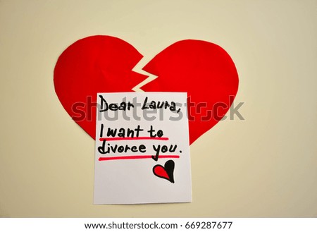 Broken red heart and i want to divorce you text on a note 