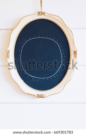 Cottage photo frame over white wall background,copy space 