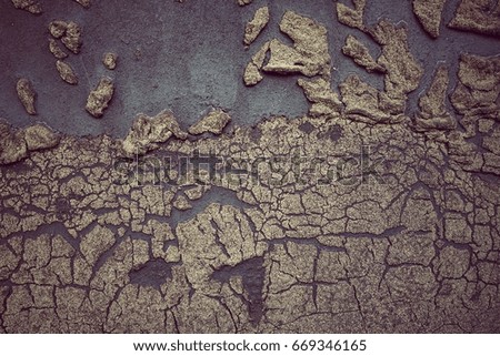 Old felt roofing tar fragment as an abstract background
