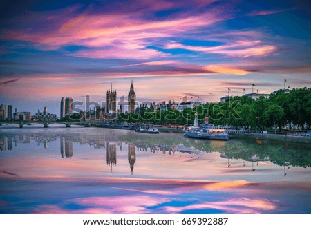 Skyline of London at dusk with Westminster and British parliament. England 