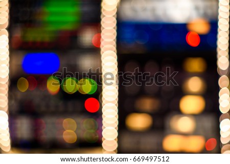 A collection of sound recording studio rack equipment lights intentionally blurred into a technical abstract background.