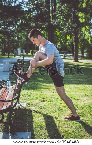 Man running in park in the morning.Photo Film look