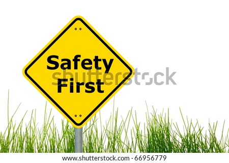 yellow sign with safety first as aid concept