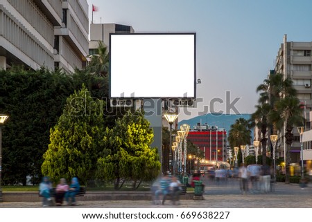 City Center Blank White Billboard with blurred people.