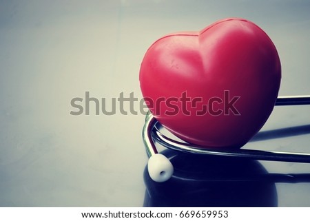 close up red heart and stethoscope on table with copy space, world health day and healthcare concept, process vintage tone  Royalty-Free Stock Photo #669659953