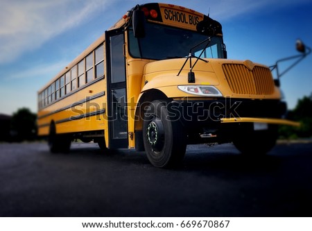 Blurred Yellow School Bus Royalty-Free Stock Photo #669670867