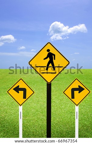 Turn sign and man walking sign