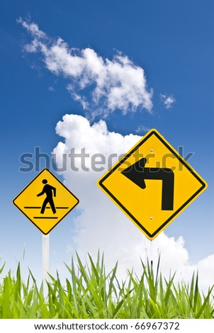 A man walking sign and turn left sign