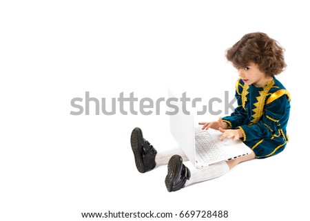 Child with laptop.Use it for a school, study or learning concept.
