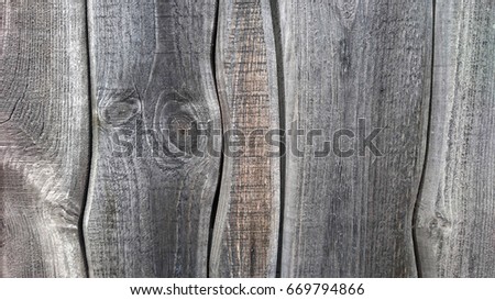 Old wood curved texture, abstract background. Old shabby rough gray wooden background. Wood texture. crooked plank and boards. puzzle jigsaw idea, sign, symbol