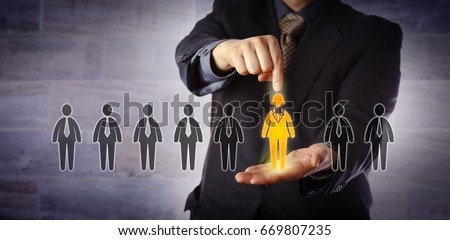 Blue chip recruitment manager selecting the only female candidate in a lineup of applicants. Business concept for gender equality, talent acquisition, career opportunity, skill and employability. Royalty-Free Stock Photo #669807235