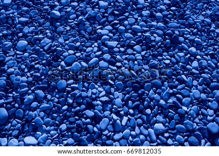Blue colored stones of the beach of Aphrodite. Souvenirs as a gift. The rock of the Greek (Petra tou Romiou). Paphos region. Cyprus island. Background