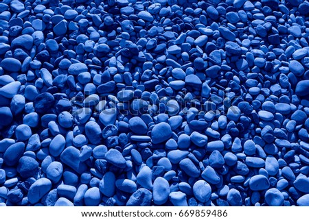 Blue colored stones of the beach of Aphrodite. Souvenirs as a gift. The rock of the Greek (Petra tou Romiou). Paphos region. Cyprus island. Background