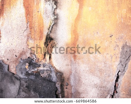 texture background, weathered rough worn old cement concrete wall. artistic strong heavy feeling expression fade yellow