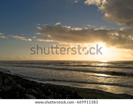 A Sunset beach on Hokitika, West Coast, New Zealand