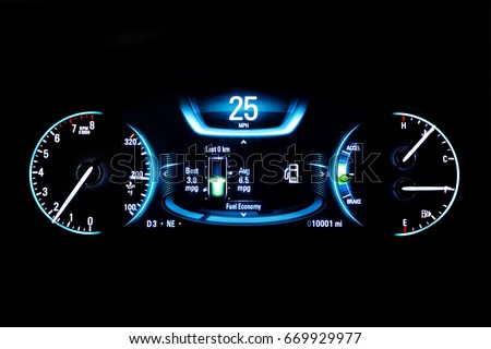 Modern light car mileage (dashboard, milage) isolated on a black background. New display of a modern car. RPM, Fuel indicator and temperature. Fuel economy. 25 mph. Royalty-Free Stock Photo #669929977