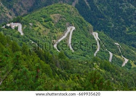 The famous hairpin curves of Alpe d'Huez - Tour de France Royalty-Free Stock Photo #669935620