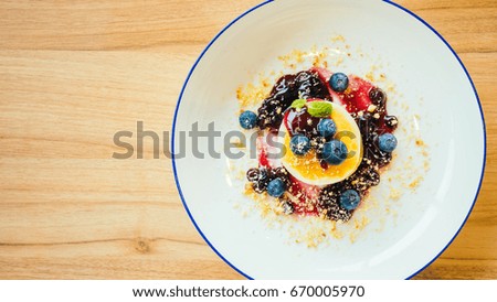 Sweet dessert Pancakes with blueberry and sauce in white plate - Color Filter Processing