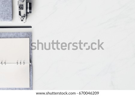Business concept - Top view of modern office marble desktop background with blank notebook, pencil for mockup design and copy space