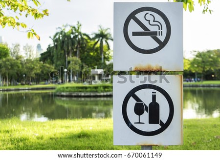 Label no smoking and littering sign  metal sign in the park