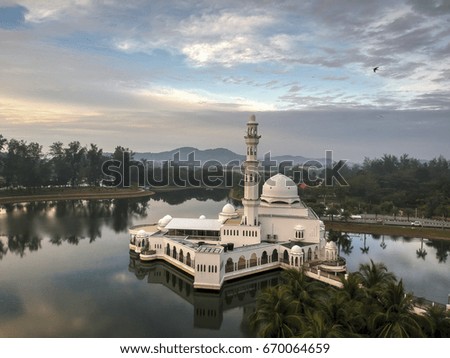 Aerial Photo - a mosque at dawn/sunrise. Soft Focus, vibrant colors.