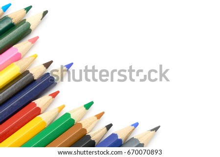 Close up macro shot set of color pencils for school or professional use on white background, copy space