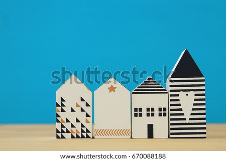 small house model over wooden floor. selective focus.