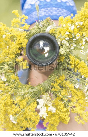Photographer on a flower meadow