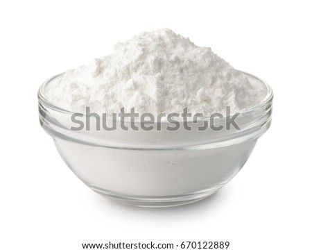 Glass bowl of corn starch isolated on white Royalty-Free Stock Photo #670122889