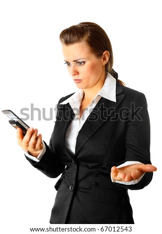 Modern business woman surprisedly looking at mobile phone isolated on white