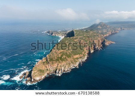 Cape Point and Cape of good hope (South Africa) aerial view shot from a helicopter Royalty-Free Stock Photo #670138588