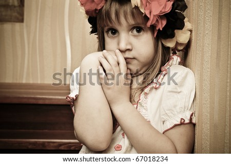 Picture of a funny little girl playing  model