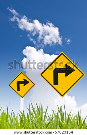 Turn right sign with blue sky