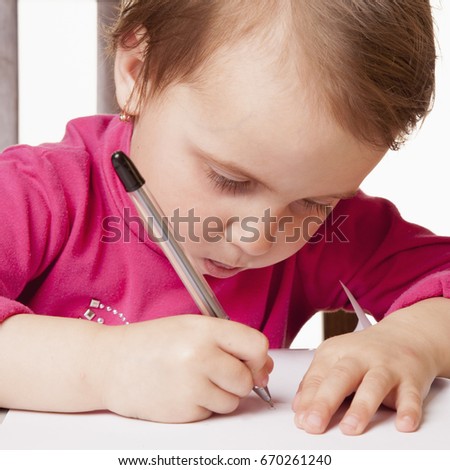 Cute business child girl signs a contract. Business, agreement, success, profit.  (humorous picture)