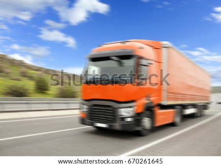 Blured Truck On Highway