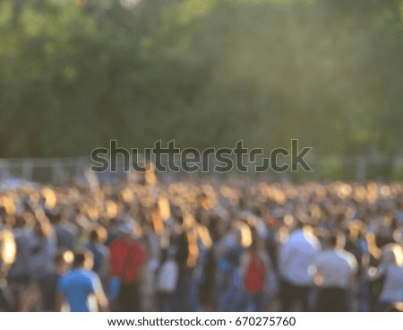 blurred people crowd at the concert, open air background