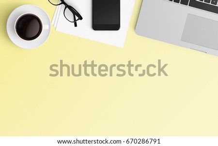 Minimal workspace with laptop, coffee cup and smartphone copy space on color background. Top view. Flat lay style.